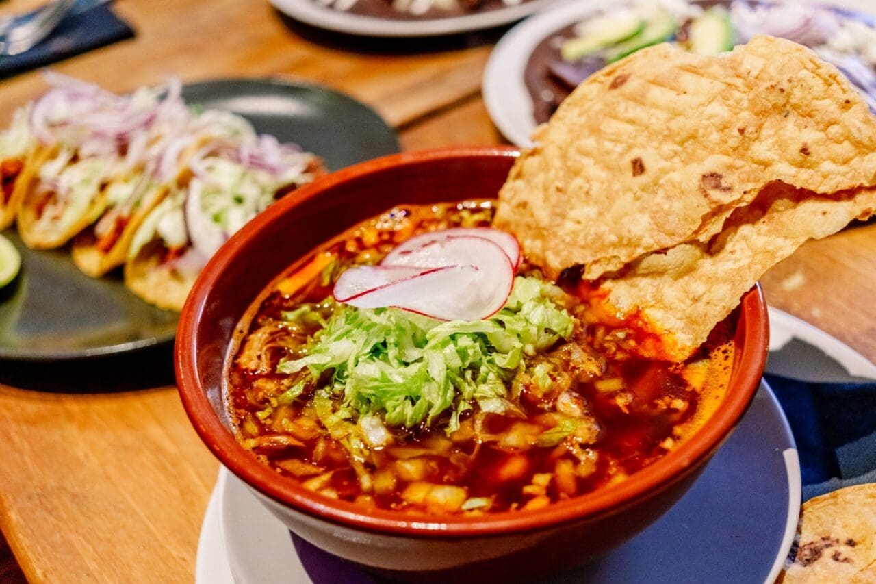 Chicken and corn soup with Mexican lettuce, a traditional pozole
